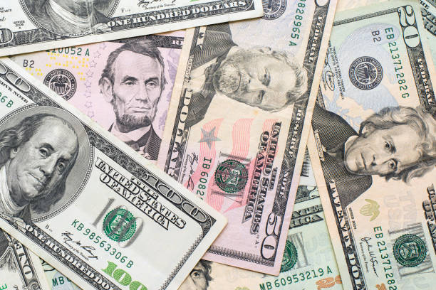 istock Money, background of dollar bills. 944097178