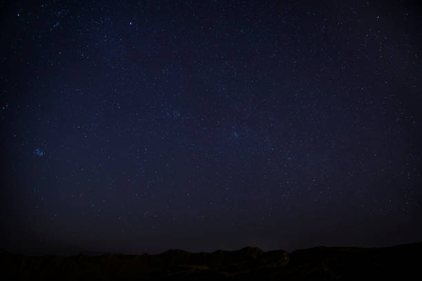 istock Starry sky above the stone desert 944102364