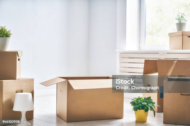 Cardboard Boxes In Room Stock Photo - Download Image Now - Box - Container, Relocation, Cardboard