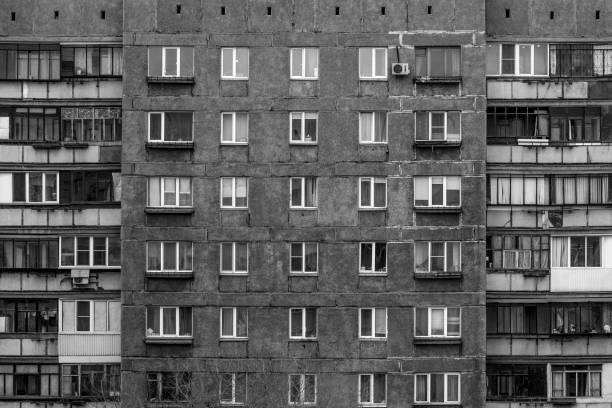 istock Black and white windows of a multi-storey building 944103656