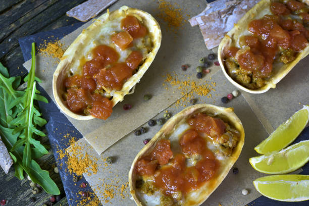 istock Mexican food - delicious taco shells 944108628