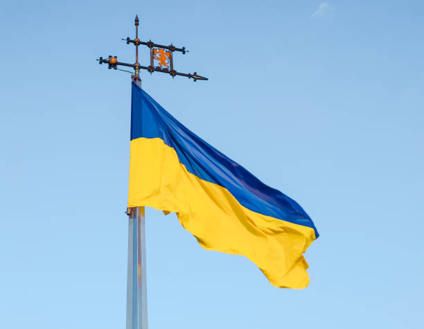 istock Ukrainian flag flying in the wind on Lviv High Castle 944111940