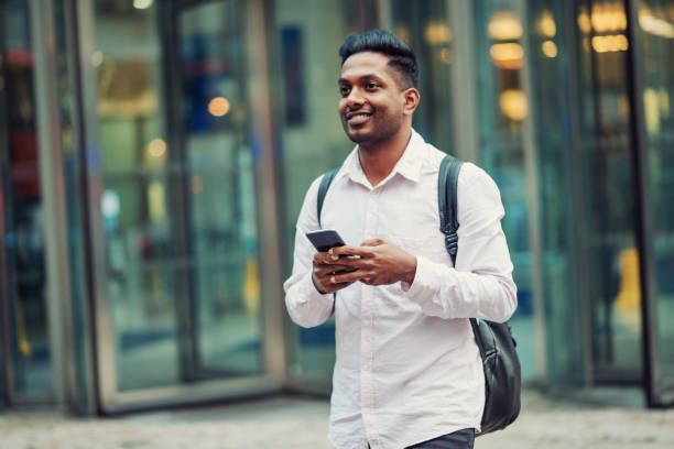 istock Indian guy in rushing to the meeting 944134772