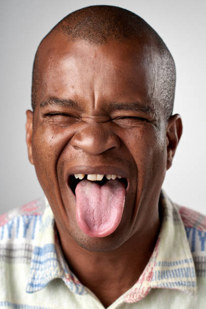 istock Studio portrait of African man making a silly face 944137854