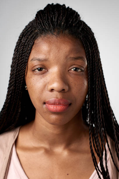 istock Studio ID portrait of African woman with serious expression 944138224