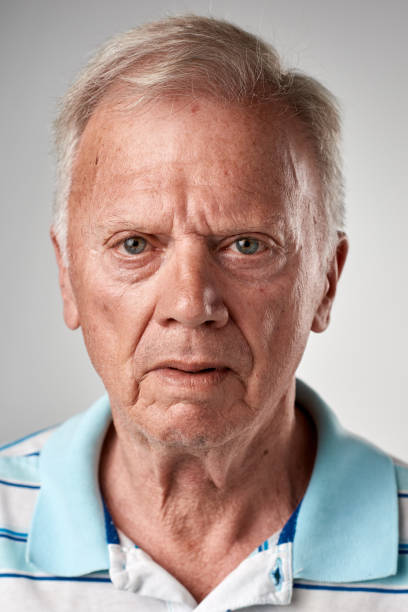 istock Studio ID portrait of old white man with serious expression 944138284
