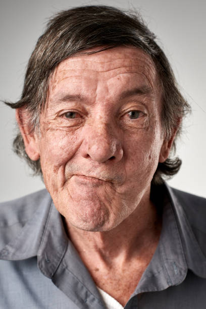 istock Studio portrait of old white manStudio portrait of old white man making a silly expression 944138364