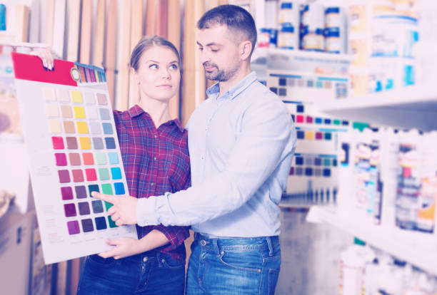 istock Two designer are looking sample of materials for repair 944138642