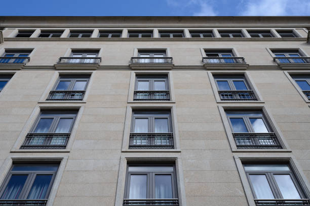 istock modern building photographed from below against the blue sky 944141994