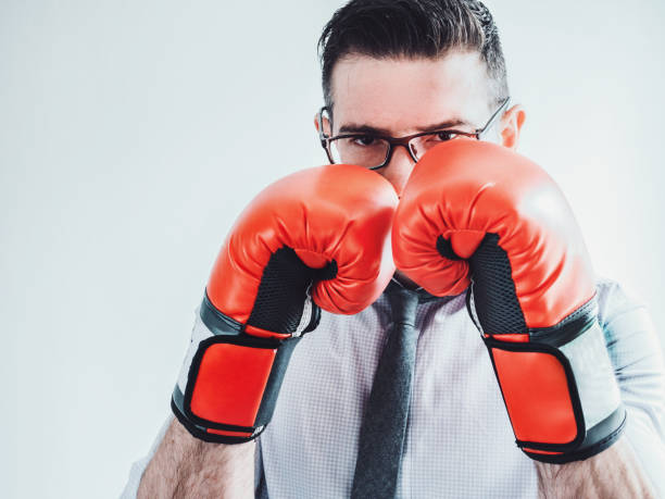 istock Businessman and red boxing gloves 944152218