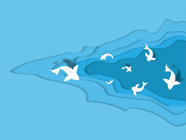 istock abstract paper cut abstract wave with white fish in blue color,paper art concept 944153132