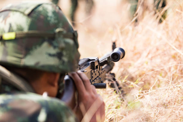 istock Close-Up Of Army Shooting With Rifle 944158594