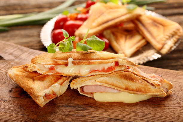 istock Fresh toast with cheese, ham and tomato 944158928