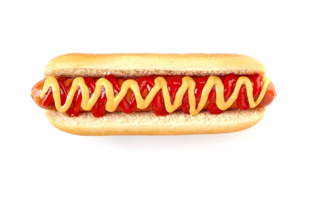 istock Hot dog with ketchup and mustard on white 944159112