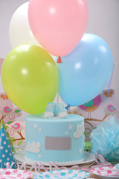 istock Birthday party with blue cake and balloons 944159436