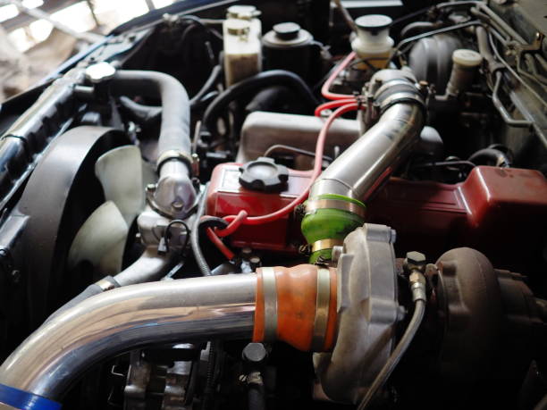 Close up turbo charger on car engine.