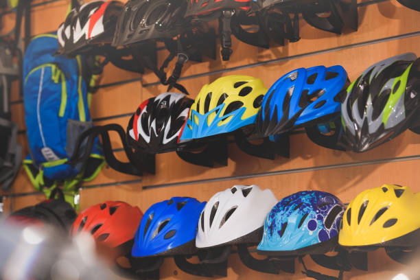 istock various colorful helmets displayed in bicycle shop 944198420