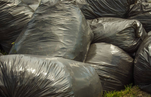 istock Fresh Grass Clippings in Garbage Bags 1 944199460