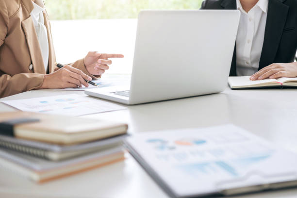 istock Business team meeting working with new startup project, discussion and analysis data the charts and graphs, calculator, laptop computer using, Business finances and accounting concept 944211494