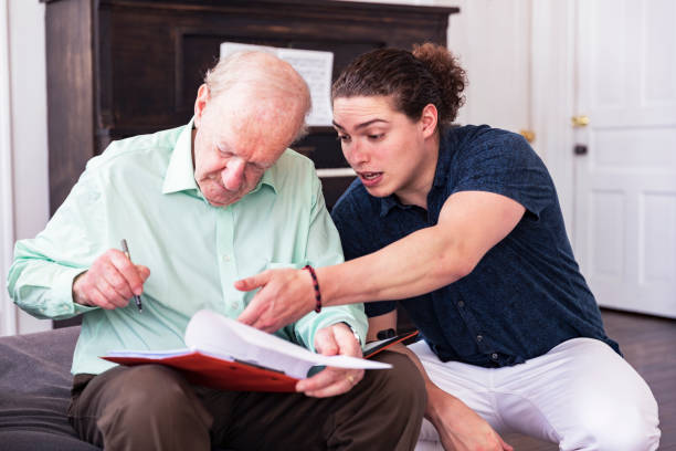 istock Assisting father with retirement investments 944217498