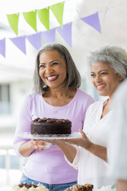 istock Women host a cancer awareness event 944221330