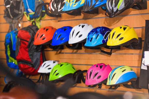 istock various colorful helmets displayed in bike shop 944239438