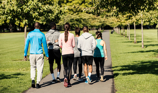 Multi-ethnic joggers running