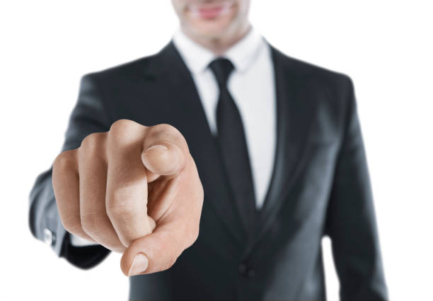 Businessman showing with oversized hand