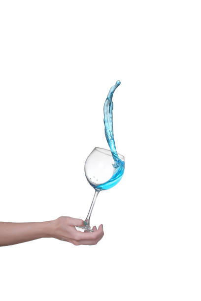 Blue alcoholic cocktail on white isolate splash