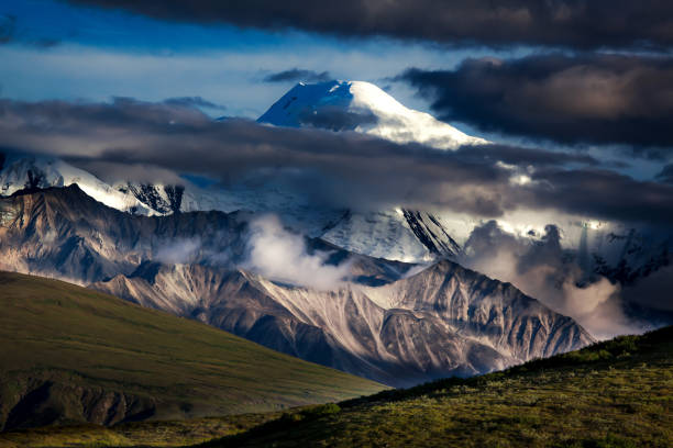 The Alaska Range Shadows and Peaks as the clouds move out of Denali National Park, Alaska. trailblazing stock pictures, royalty-free photos & images