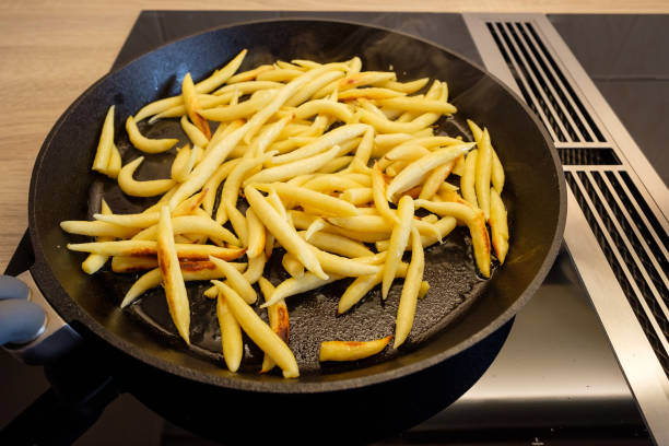 istock Potato dumplings frying in a iron cast pan 944258720