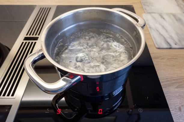 istock Cooking pot with boiling water on a stove 944258782