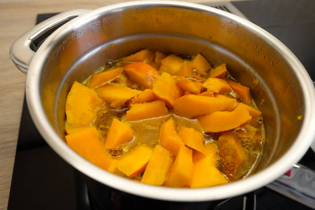 istock Orange Hokkaido pumpkin in a cooking pot 944259178
