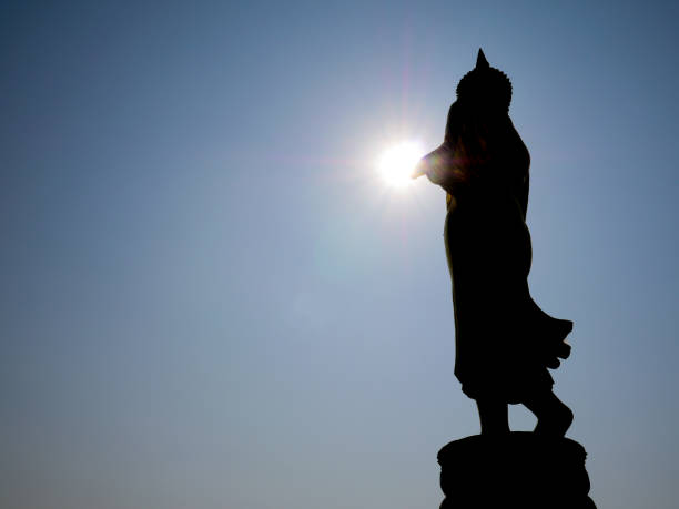istock The buddha with the sunlight background 944260102