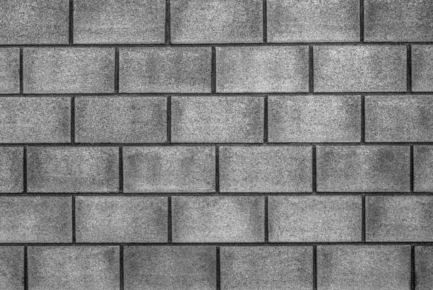 istock Stylish stone wall background in black and white 944260772