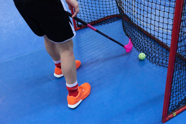 istock Floorball player with stick and ball. Above view 944267466