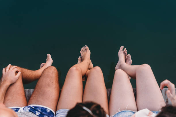istock Friends relaxing on the pier 944269814