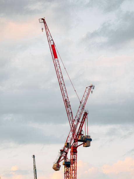 istock Construction cranes in the city 944282388