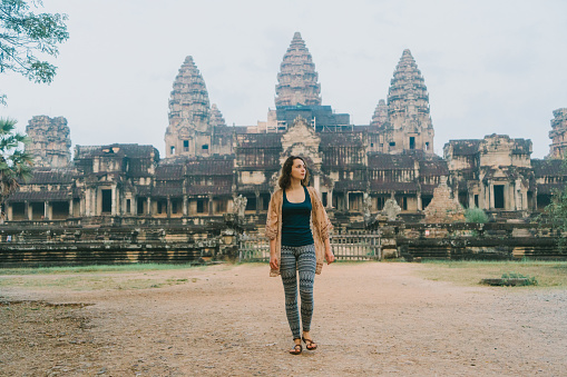 Young Caucasian woman in Angkor Wat, Siem Reap, Cambodia