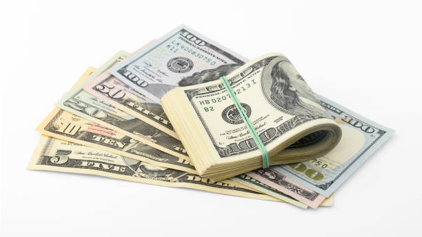 istock Fan and stack American money  dollar bill isolated on white background clipping path. Pile US banknote 944297476
