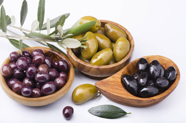 istock olive wood bowls with different types of olives 944303880