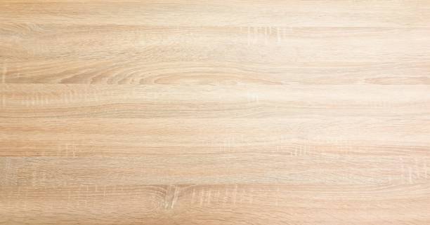 istock Light brown soft varnished wood texture surface as background. Grunge washed wooden planks table pattern top view. 944306732