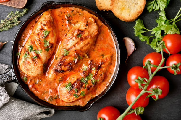 istock Chicken breast in tomato sauce 944309882