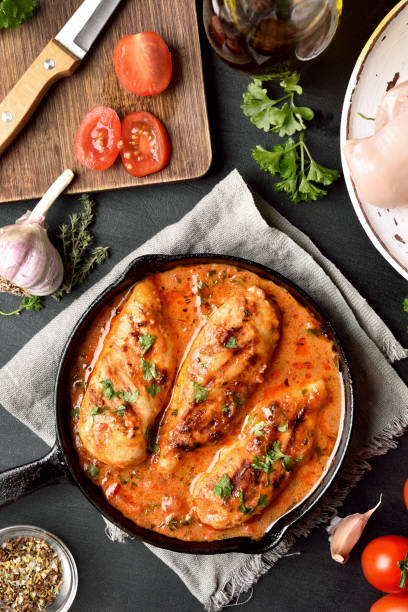 istock Chicken breast in tomato sauce 944309902