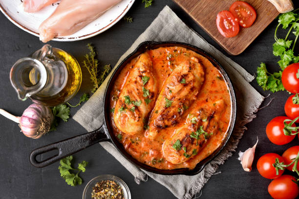 istock Chicken breast in tomato sauce 944309916