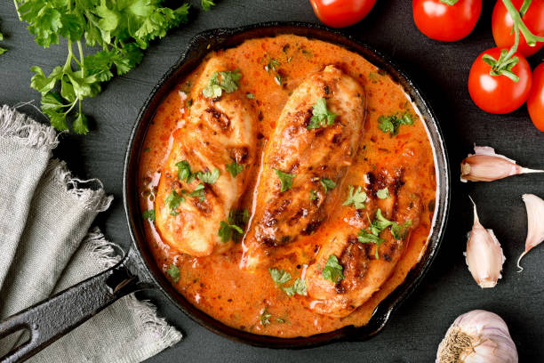 istock Chicken breast in tomato sauce 944309918