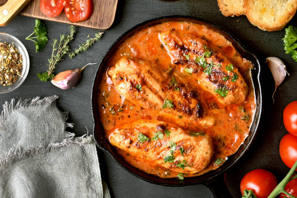 istock Chicken breast in tomato sauce 944309944