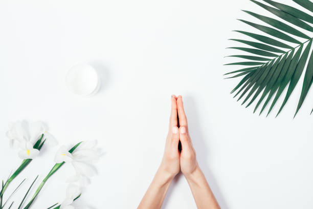 istock Top view of female hands doing namaste gesture 944319184