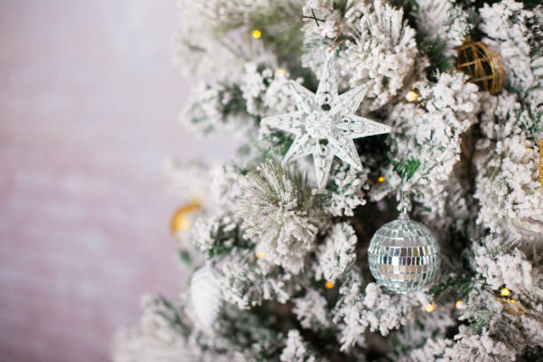 istock Beautifully decorated Christmas tree with presents under it. 944319450