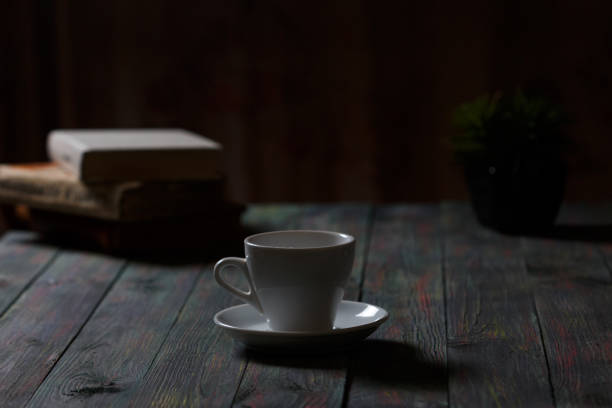 istock A cup of coffee in the workplace on a wooden table. 944324098